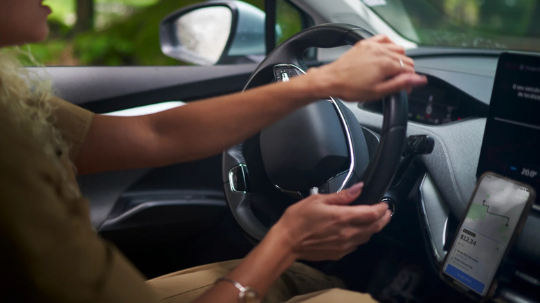 A woman driving a car