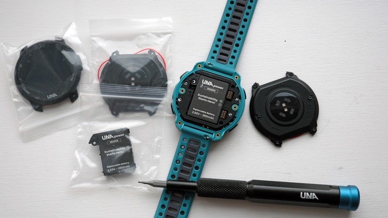 Una Watch and a number of new spare parts in bags.