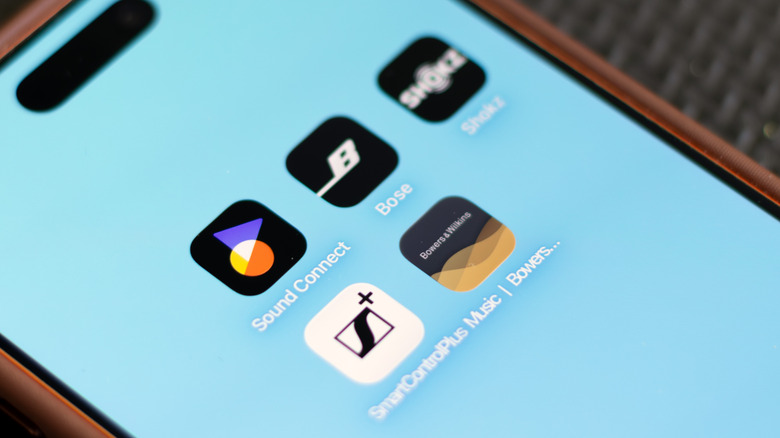 Closeup of several headphone app icons on iOS.