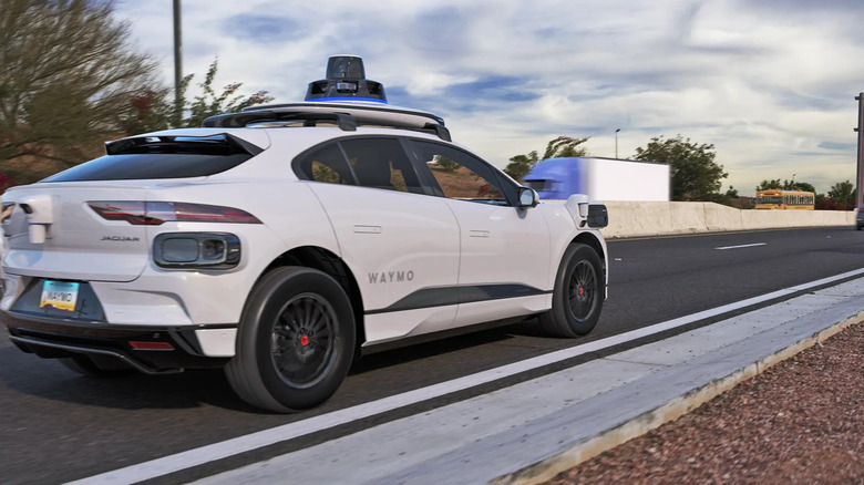 Waymo robotaxi is shown on a freeway in Phoenix