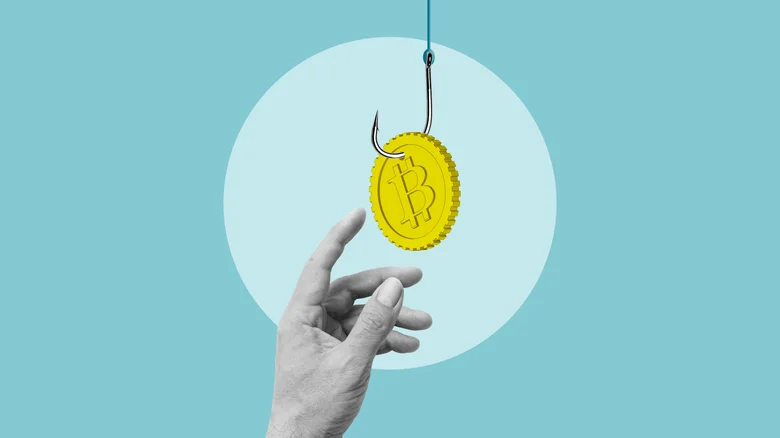 A hand reaching for a Bitcoin that has a fishing hook through it.