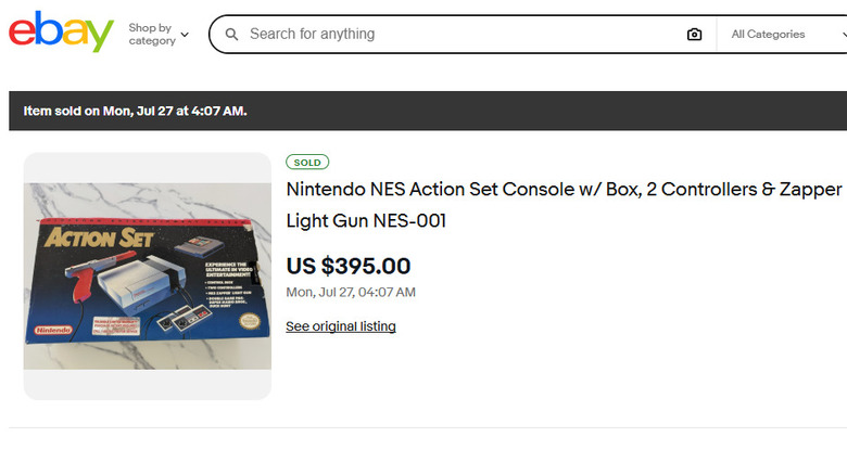Sold listing of a Nintendo NES Action Set console with a sale price of $395.