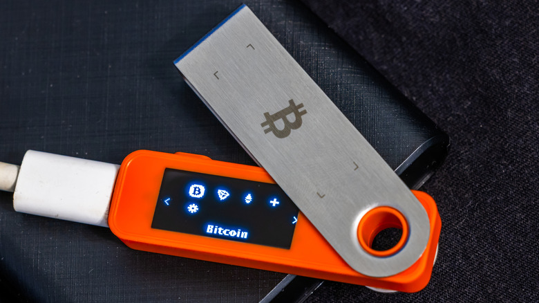 A crypto hardware wallet connected via USB