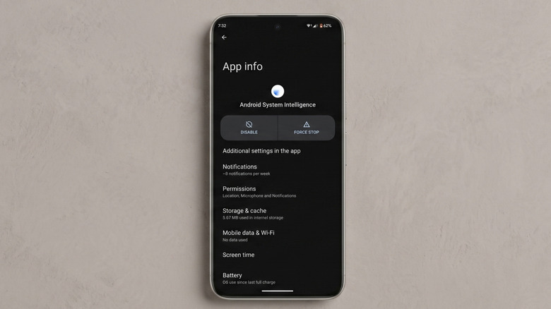 App Settings showing the option to disable and force stop the Android System Intelligence app.