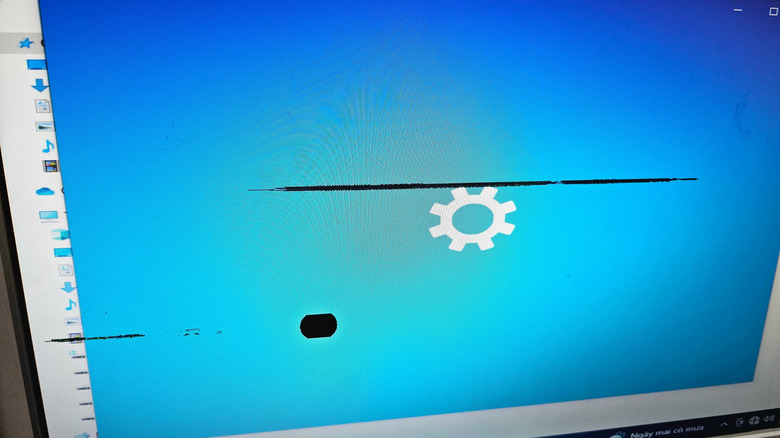 A computer screen with many clusters of dead pixels