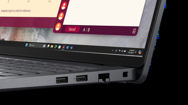 Dell Pro 14 laptop with a battery symbol next to one of its ports.