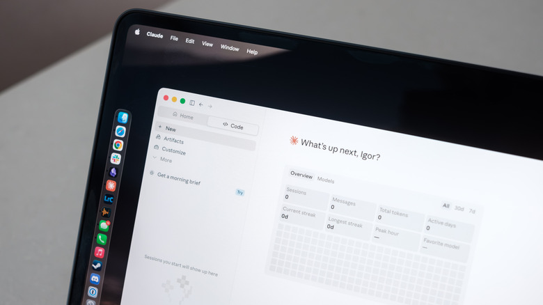 A MacBook Air runs Claude Code.