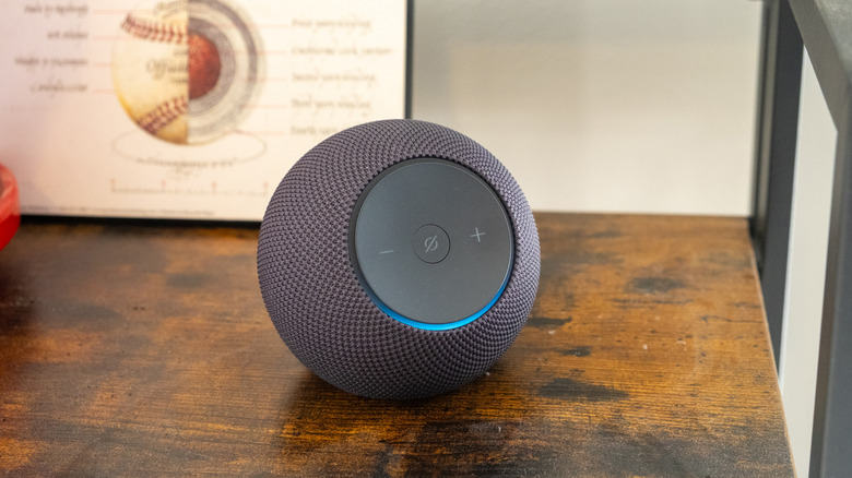 An Amazon Echo Dot Max sitting on a shelf
