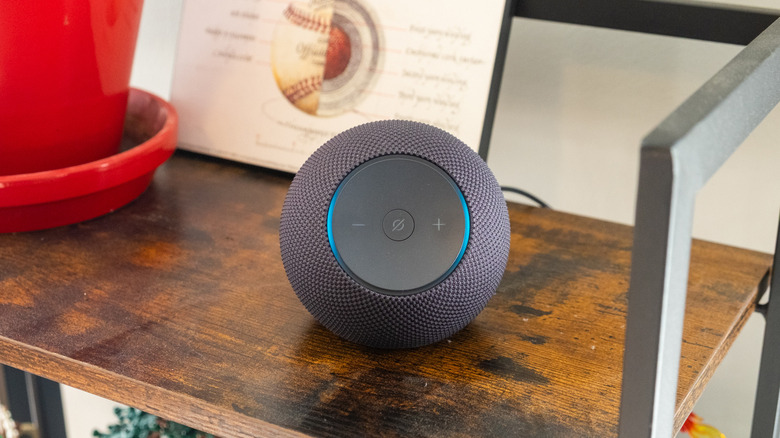 An Amazon Echo Dot Max on a cabinet