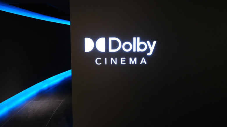 Dolby Cinema logo on entrance to theater auditorium