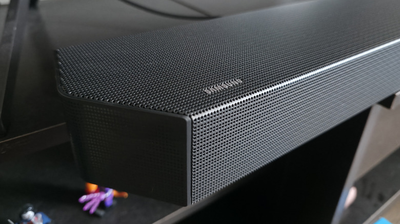 Close-up of a Samsung soundbar on a media console.