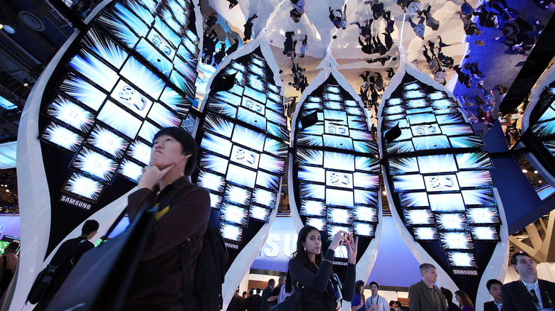 CES attendees view Samsung's 3D TVs in 2012.
