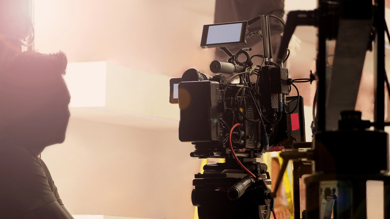 A professional movie camera with operator.