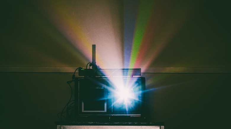 The view of a modern movie projector, visible from the front.