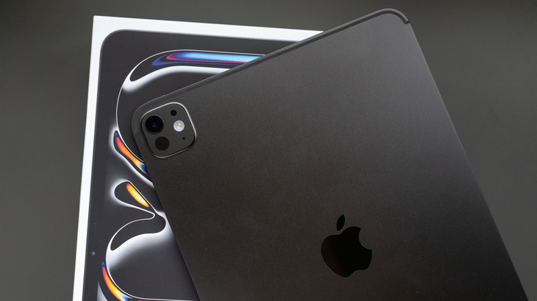 The rear of an iPad Pro M4, above its box.