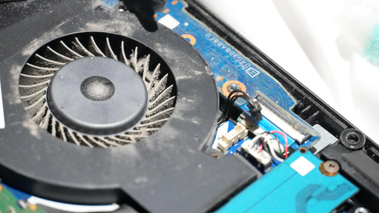 A PC fan covered in dust.