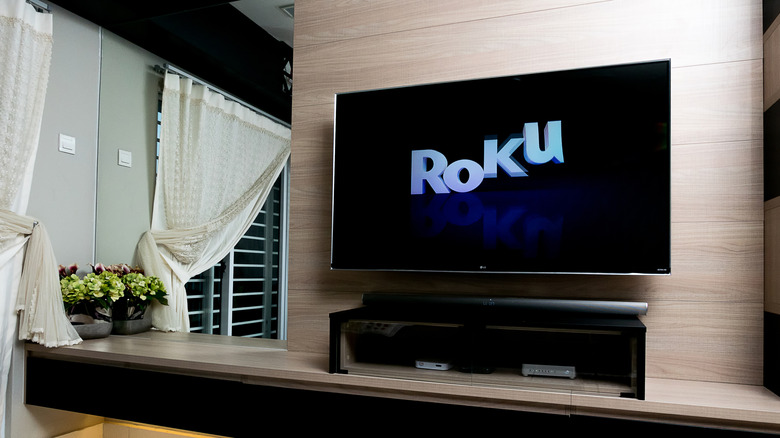 A TV with the Roku logo on the screen.