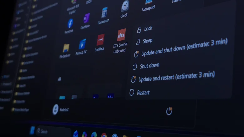 Windows 11 shutdown and restart options in the Start Menu, prompting to install an update.