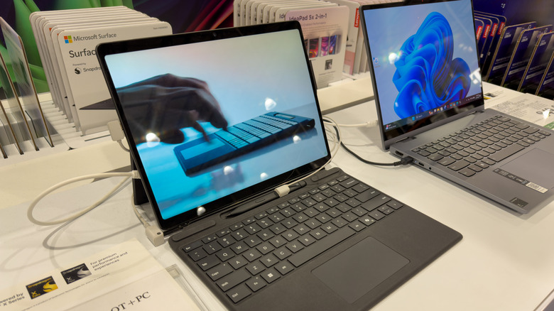 Microsoft Surface tablets in a store running Windows 11