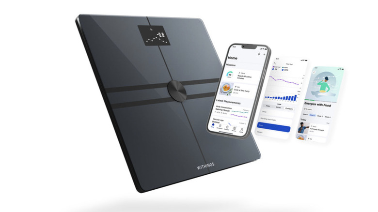Illustration of a black Withings scale and three smartphone screens displaying features of the company's health subscription