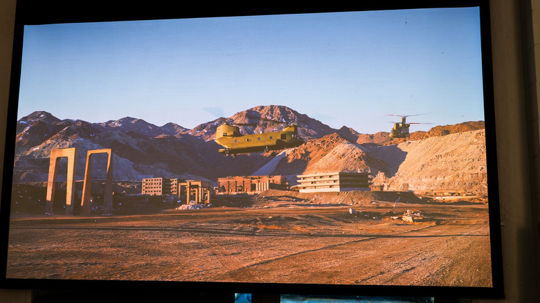 A still from the movie Tenet is shown on the XGIMI Elfin Flip 4K projector to demonstrate its quality