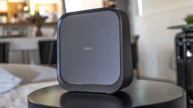 The XGIMI Elfin Flip 4K projector is shown in the folded position