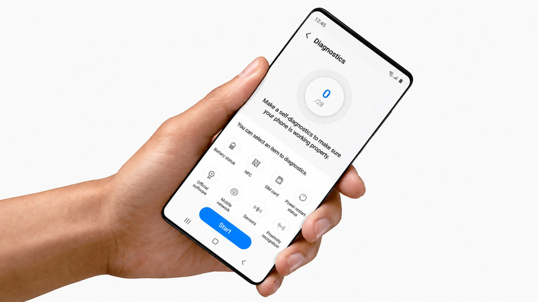 Samsung Galaxy phone displaying the Diagnostics screen in a person's hand.