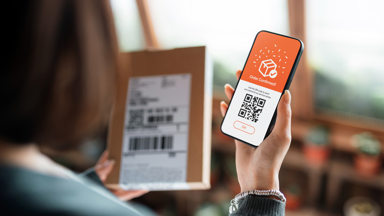 A QR code for an online purchase on a modern smartphone