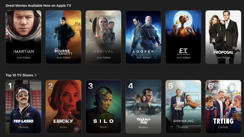 Apple TV content grid showing news movies like The Marian, Arrival and E.T.