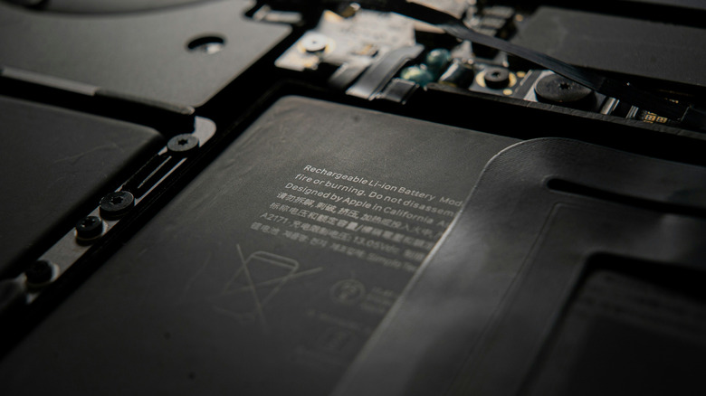 Closeup of an exposed MacBook's battery