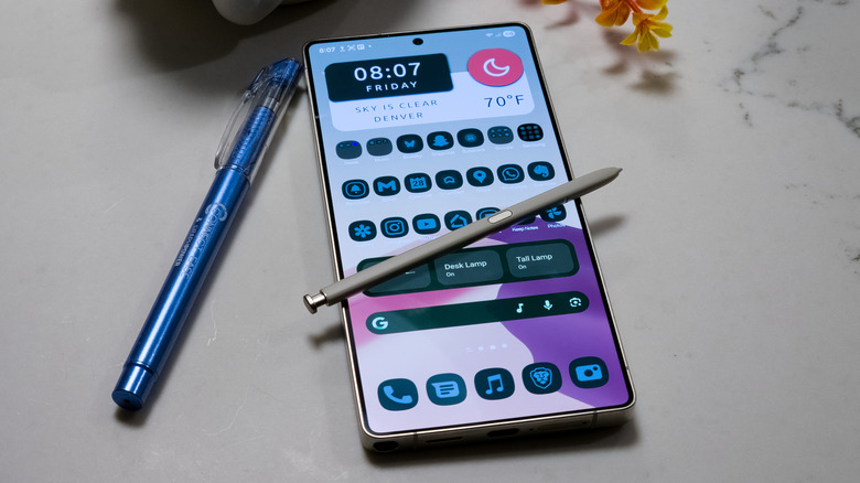 Samsung Galaxy S25 Ultra posed with S Pen on countertop