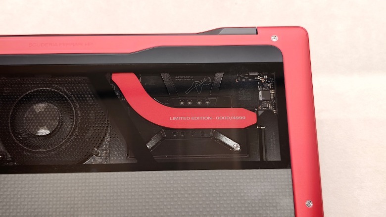 A close up of the transparent base of Ferrari and HP's Scuderia laptop