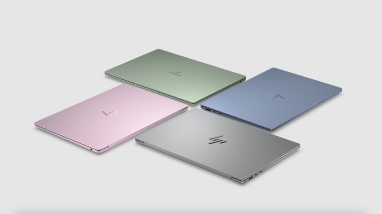 Four laptops in different colors.