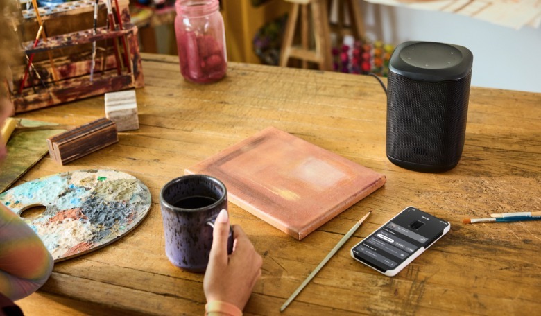 A coffee cup and a speaker.