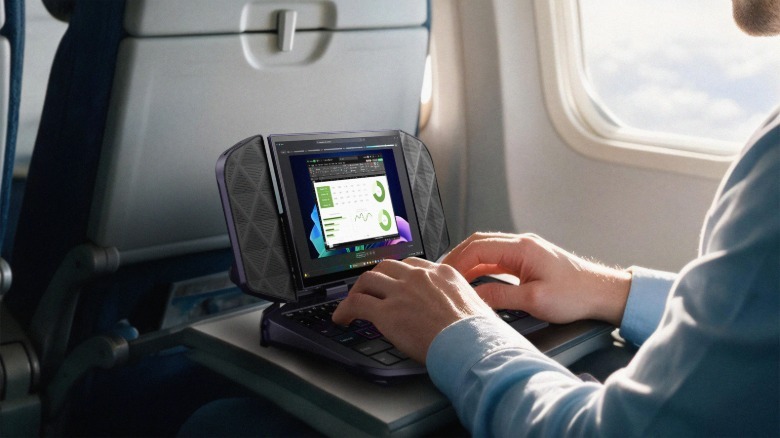 A person on a plane with a handheld device