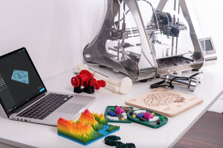 A fancy 3D printer with components.