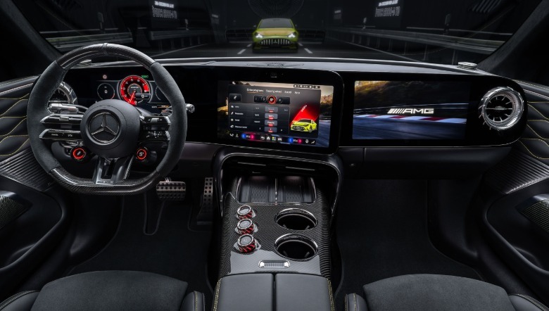 Interior of Mercedes-AMG 4-Door coupe EV showing large central screen and passenger display