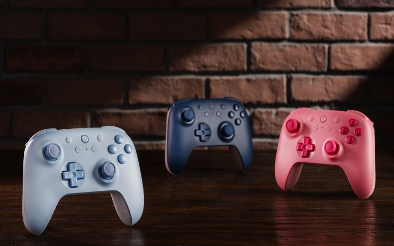 Three colors of the Ultimate 2C controller.