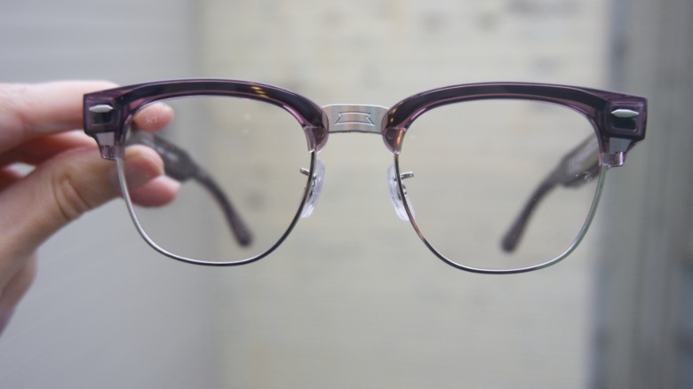 The glasses open.