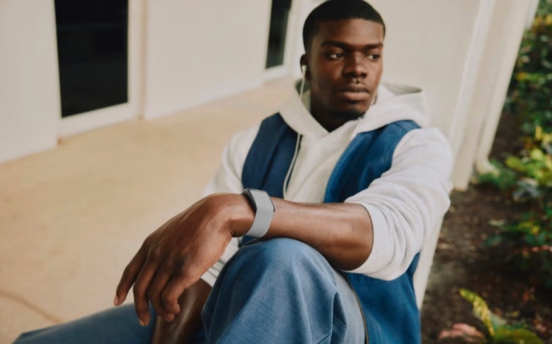 A man wears an armband.