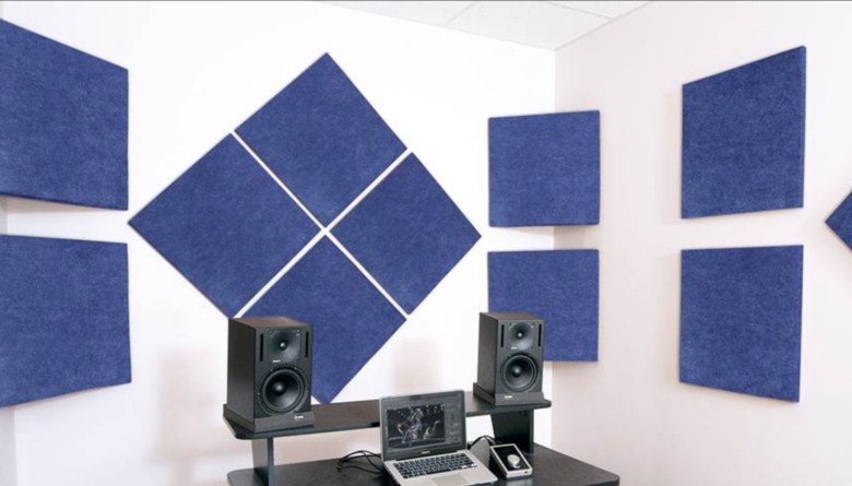Speakers with room acoustic treatment.