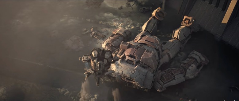 A robot head flies over a robot's torso.