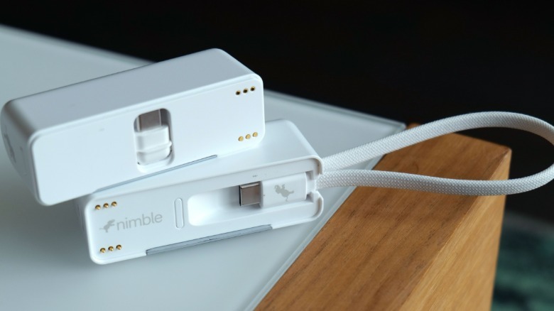 The SharePower's carrying strap is actually a built-in captured cable.