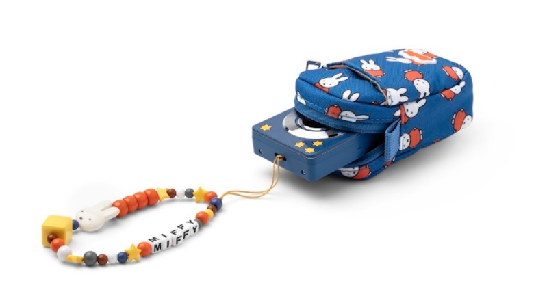 A camera and charm.