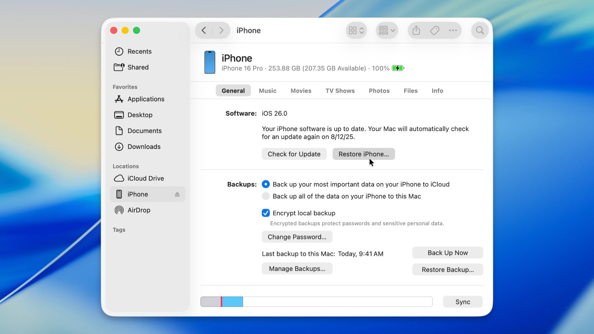 Restoring an iPhone from a Mac.